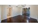 Bedroom featuring ceiling fan, mirrored closet and hardwood floors at 2205 Belleair Rd # A24, Clearwater, FL 33764