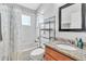 Bathroom featuring granite countertop vanity and shower with curtain at 2310 Wood Pointe Dr, Holiday, FL 34691