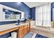 Bathroom suite with bathtub, vanity, and lots of space at 2310 Wood Pointe Dr, Holiday, FL 34691