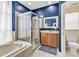 A bathroom suite boasts a bathtub and a large walk-in shower at 2310 Wood Pointe Dr, Holiday, FL 34691