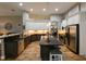 Beautiful kitchen with a large island, stainless steel appliances, and plenty of counter space at 30623 Bittsbury Ct, Wesley Chapel, FL 33543