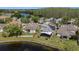 This home is located near a pond and has solar panels at 3219 Gianna Way, Land O Lakes, FL 34638