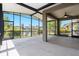 Enjoy the expansive lanai with beautiful lake views and abundant natural light at 3219 Gianna Way, Land O Lakes, FL 34638