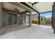 Enclosed patio with ceiling fan, wet sink, lights, and screened in openings at 3219 Gianna Way, Land O Lakes, FL 34638