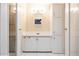 Bathroom features a clean, well-lit vanity and updated fixtures and generous storage at 472 Trout Ln, Oldsmar, FL 34677