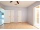 Bright bedroom with generous closet space offers a comfortable and functional layout at 472 Trout Ln, Oldsmar, FL 34677