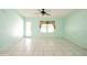Spacious living room with lots of natural light is ideal for relaxing and entertaining guests at 472 Trout Ln, Oldsmar, FL 34677