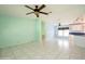 The open floor plan connects the kitchen and living room, creating a spacious and inviting atmosphere at 472 Trout Ln, Oldsmar, FL 34677