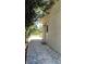 Backyard access from the home's exterior to the grassy backyard at 4824 16Th St, Zephyrhills, FL 33542