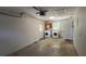 Spacious garage with laundry area, utility sink, and ample storage space at 4824 16Th St, Zephyrhills, FL 33542