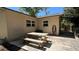 This patio features a simple outdoor dining arrangement perfect for enjoying a casual meal at 4824 16Th St, Zephyrhills, FL 33542