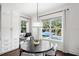 Eat in kitchen area with large windows showing the lanai and pool at 5025 W Homer Ave, Tampa, FL 33629