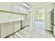 Clean kitchen with stainless steel dishwasher and fixtures, with bright natural light at 5043 Osprey Ln, New Port Richey, FL 34652