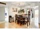 Formal dining room with hardwood floors and a large mirror that amplifies the space at 5150 10Th N Ave # 302, St Petersburg, FL 33710