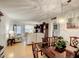 Open-concept dining area featuring hardwood floors, seamlessly connected to the living room at 5150 10Th N Ave # 302, St Petersburg, FL 33710
