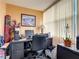 Room with large windows, a desk, and office equipment at 5150 10Th N Ave # 302, St Petersburg, FL 33710