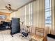 Bright room featuring a stationary bike, treadmill and large windows at 5150 10Th N Ave # 302, St Petersburg, FL 33710