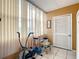 A well-lit room with exercise equipment, a chair, and large window at 5150 10Th N Ave # 302, St Petersburg, FL 33710