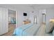 Stylishly decorated bedroom with ceiling fan, and ample natural light at 6051 Sun Blvd # 111, St Petersburg, FL 33715