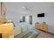 Stylishly decorated bedroom with ceiling fan, and water view at 6051 Sun Blvd # 111, St Petersburg, FL 33715