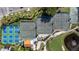 Aerial view featuring tennis courts and pickleball courts, showcasing the community's recreational amenities at 6051 Sun Blvd # 111, St Petersburg, FL 33715