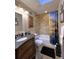 Full bathroom featuring a decorative vanity, bathtub, and shower with tiled walls at 6805 Monet Cir, Temple Terrace, FL 33617
