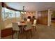 Cozy breakfast nook with built-in seating, pendant lighting, and storage cabinets at 6805 Monet Cir, Temple Terrace, FL 33617