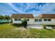 Backyard with patio, grass, and garden at 6935 Monte Carlo N, Pinellas Park, FL 33781