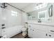 Renovated bathroom with modern fixtures, shower, and vanity at 6935 Monte Carlo N, Pinellas Park, FL 33781