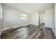 Bedroom with wood-look flooring and ensuite bathroom at 6935 Monte Carlo N, Pinellas Park, FL 33781