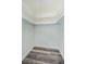 Walk-in closet with built-in shelving and wood-look flooring at 6935 Monte Carlo N, Pinellas Park, FL 33781