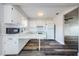 A bright kitchen with white cabinets and updated countertops is great for entertaining at 6935 Monte Carlo N, Pinellas Park, FL 33781