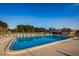 A refreshing community pool with lounge chairs for residents to relax and soak up the sun at 6935 Monte Carlo N, Pinellas Park, FL 33781