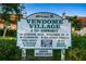 Community sign indicating Vendome Village is a 55+ community with available units at 6935 Monte Carlo N, Pinellas Park, FL 33781