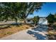 Charming home exterior with well-maintained landscaping and a welcoming facade at 7051 Dartmouth N Ave, St Petersburg, FL 33710