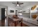Inviting bedroom with bunk beds, a foosball table, and a comfortable seating area at 7311 N Dartmouth Ave, Tampa, FL 33604
