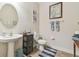 Comfortable powder room featuring vessel sink at 8248 Sequester Loop, Land O Lakes, FL 34637