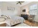 Nicely decorated bedroom with ceiling fan and stylish furniture at 8248 Sequester Loop, Land O Lakes, FL 34637
