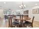 Spacious dining area adjacent to the living room and kitchen at 8248 Sequester Loop, Land O Lakes, FL 34637