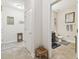 Hallway leading to a half bathroom at 8248 Sequester Loop, Land O Lakes, FL 34637