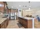 Kitchen featuring stainless appliances, tile backsplash, and granite counters at 8248 Sequester Loop, Land O Lakes, FL 34637
