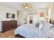 Bright main bedroom with ample closet space and wood floors at 8248 Sequester Loop, Land O Lakes, FL 34637