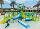 A community water park featuring multiple slides, interactive elements, and a splash zone for to enjoy at 8248 Sequester Loop, Land O Lakes, FL 34637