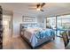 Comfortable bedroom with view of lanai at 8251 Brent St # 941, Port Richey, FL 34668