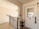 Welcoming entrance to unit 941 with a white door, decorative glass, and charming accents at 8251 Brent St # 941, Port Richey, FL 34668