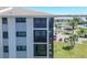 Beautiful condo with multiple balconies and view of tennis courts and community pool in a desirable location at 8251 Brent St # 941, Port Richey, FL 34668