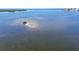 Aerial view of bay featuring blue water, vegetated areas, and coastal beauty at 8251 Brent St # 941, Port Richey, FL 34668