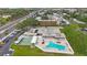 An aerial view of the condo complex showcasing the beautiful pool and grounds at 9945 47Th Ave N # 203, St Petersburg, FL 33708