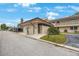 Exterior shot of a cozy condo building with well maintained lawn and street access at 9945 47Th Ave N # 203, St Petersburg, FL 33708