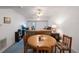 Cozy living room with two sofas, ceiling fans, and carpeted floor at 9945 47Th Ave N # 203, St Petersburg, FL 33708